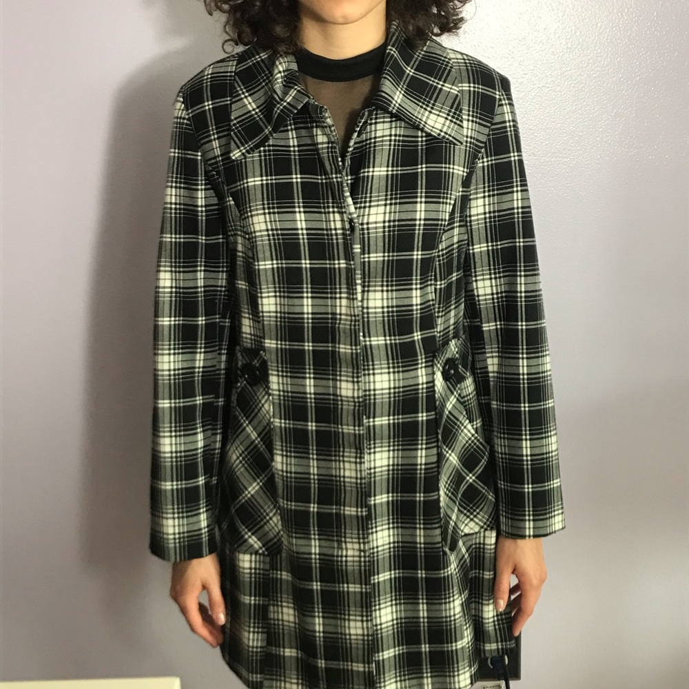 Black and white plaid coat.